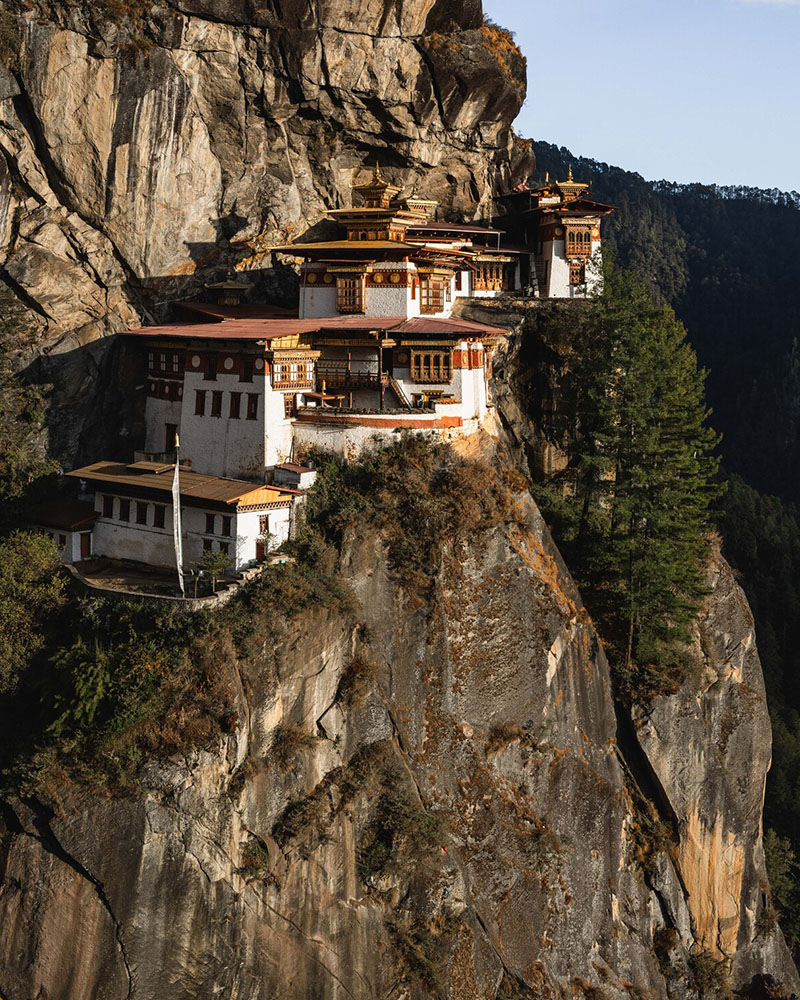 Paro Taktsang monastery built into a Himalayan cliff face